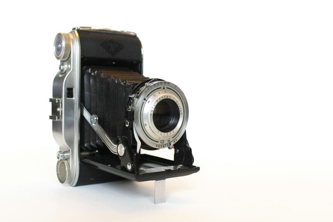 Vintage Afga folding camera on white background. This was one of my many cameras in my vintage camera collection which I sadly lost in a house fire last February. I am slowly working on rebuilding my collection, little by little!