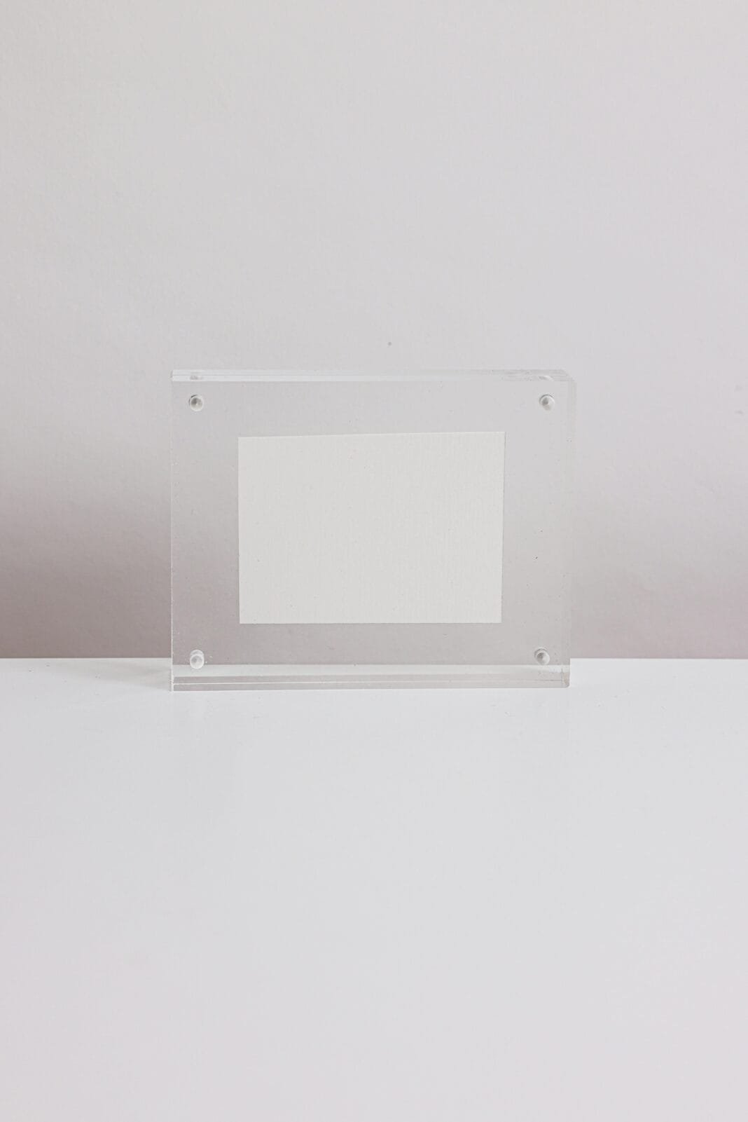 White rectangular frame with white paper