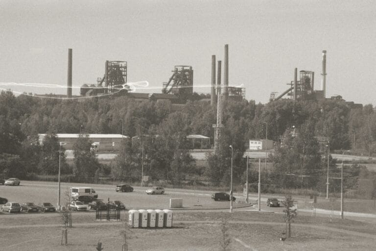 a black and white photo of an industrial area stockpack unsplash