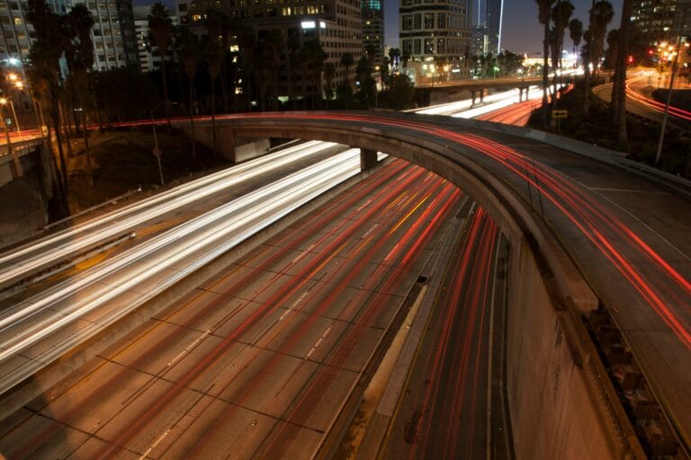 time lapse photo of a los angeles freeway at night stockpack unsplash