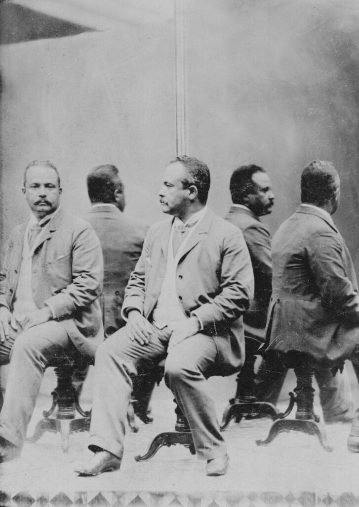 [Unidentified African American man posed, full-length, seated, facing left, in front of mirrors, which reflect four mirror images of him], between ca. 1850 and 1880(?). Library of Congress Prints & Photographs Division. https://www.loc.gov/item/00650852/